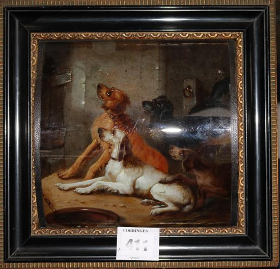 Follower of Armfield, four dogs in a kennel, reverse-painted in oils on a bowed glass panel,